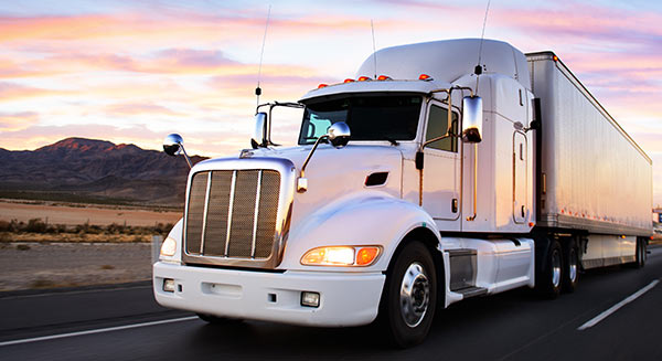 semi-trailer truck traveling on highway